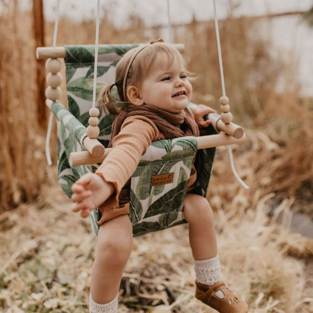 Sweet Swinging Outdoor Swing High Back Tropical Leaf