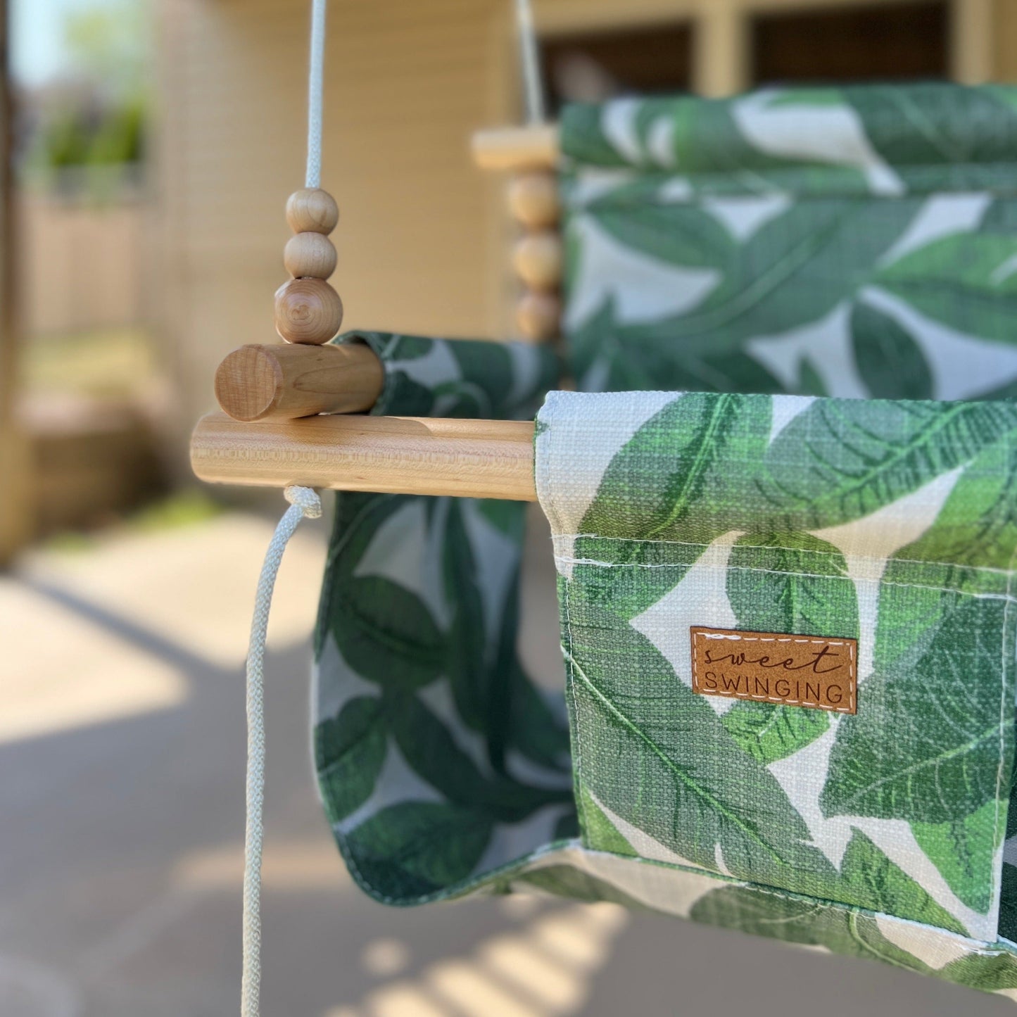 Sweet Swinging Outdoor Swing High Back Tropical Leaf
