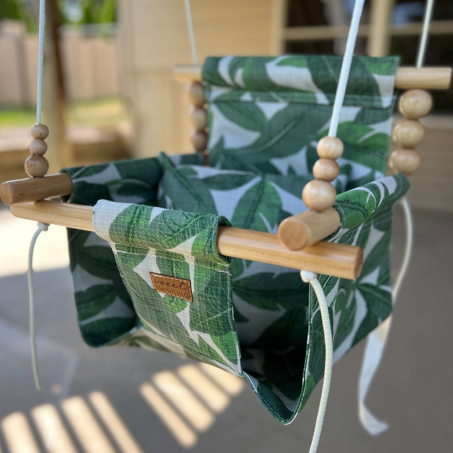 Sweet Swinging Outdoor Swing High Back Tropical Leaf