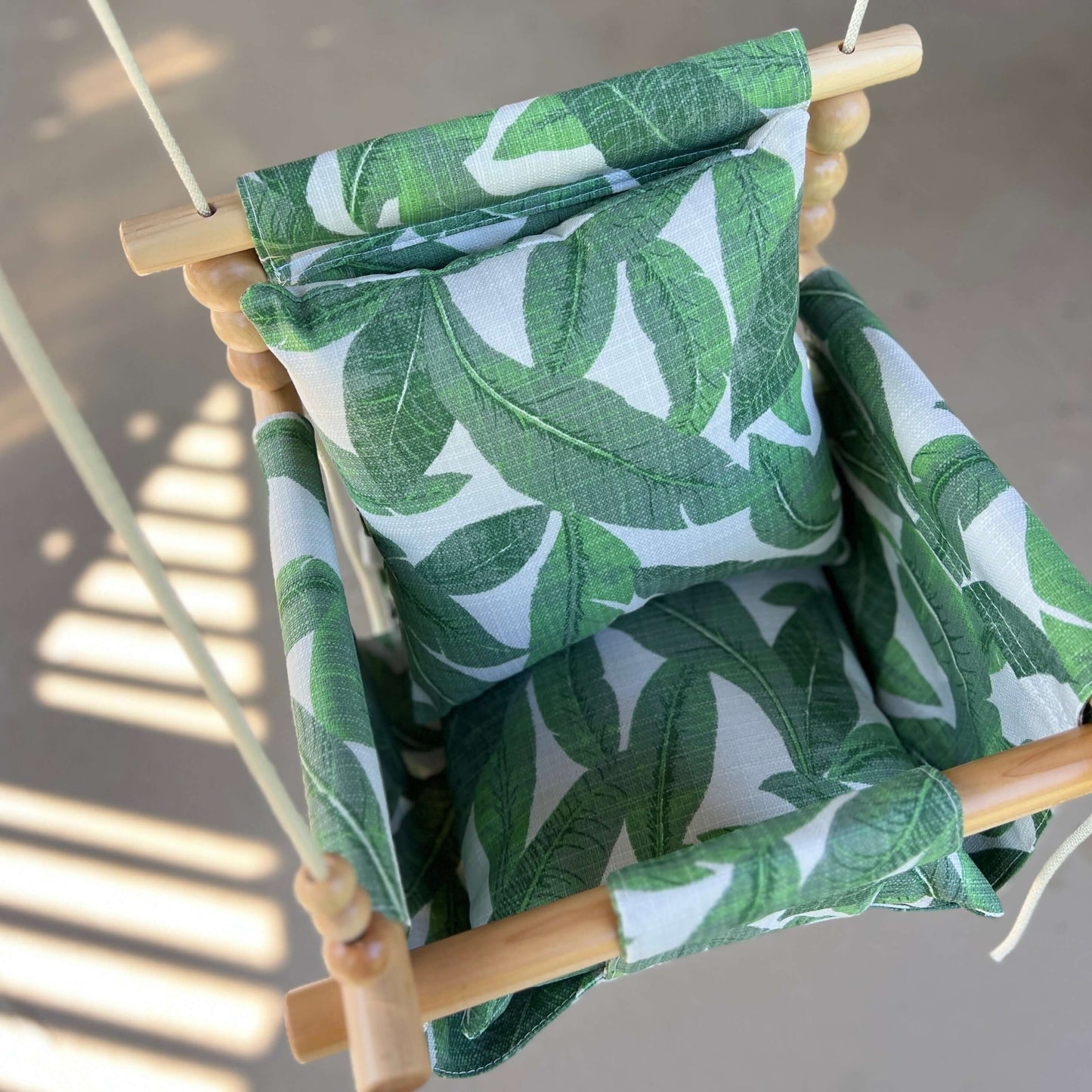 Sweet Swinging Outdoor Swing High Back Tropical Leaf