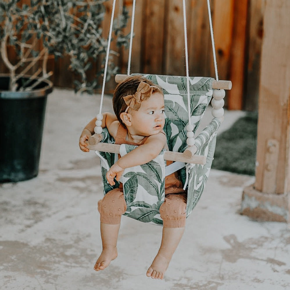 Sweet Swinging Outdoor Swing High Back Tropical Leaf
